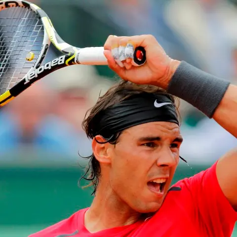 Tennis: Murray battles, Nadal eases through in France