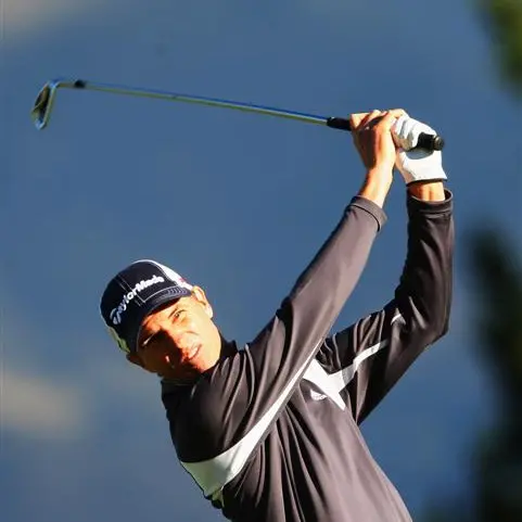 Golf: Caddy steps into keep Alker on course