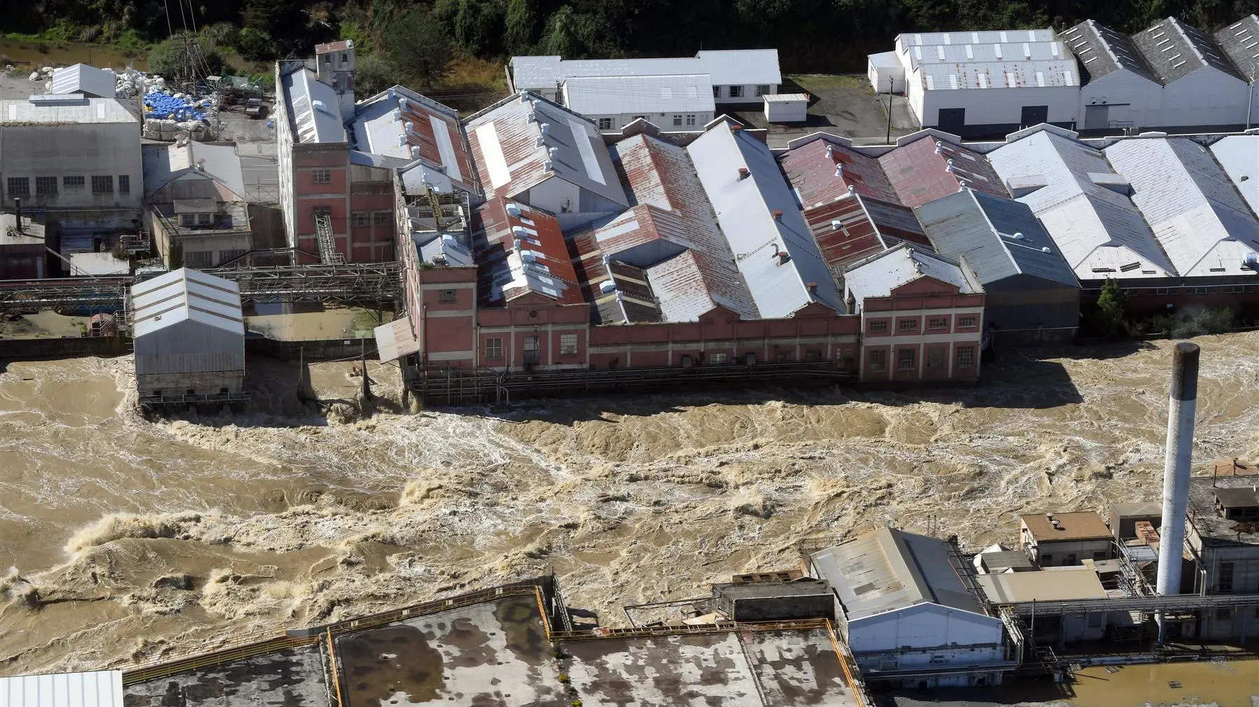 Firefighters to enter paper mill to assess toxic risk