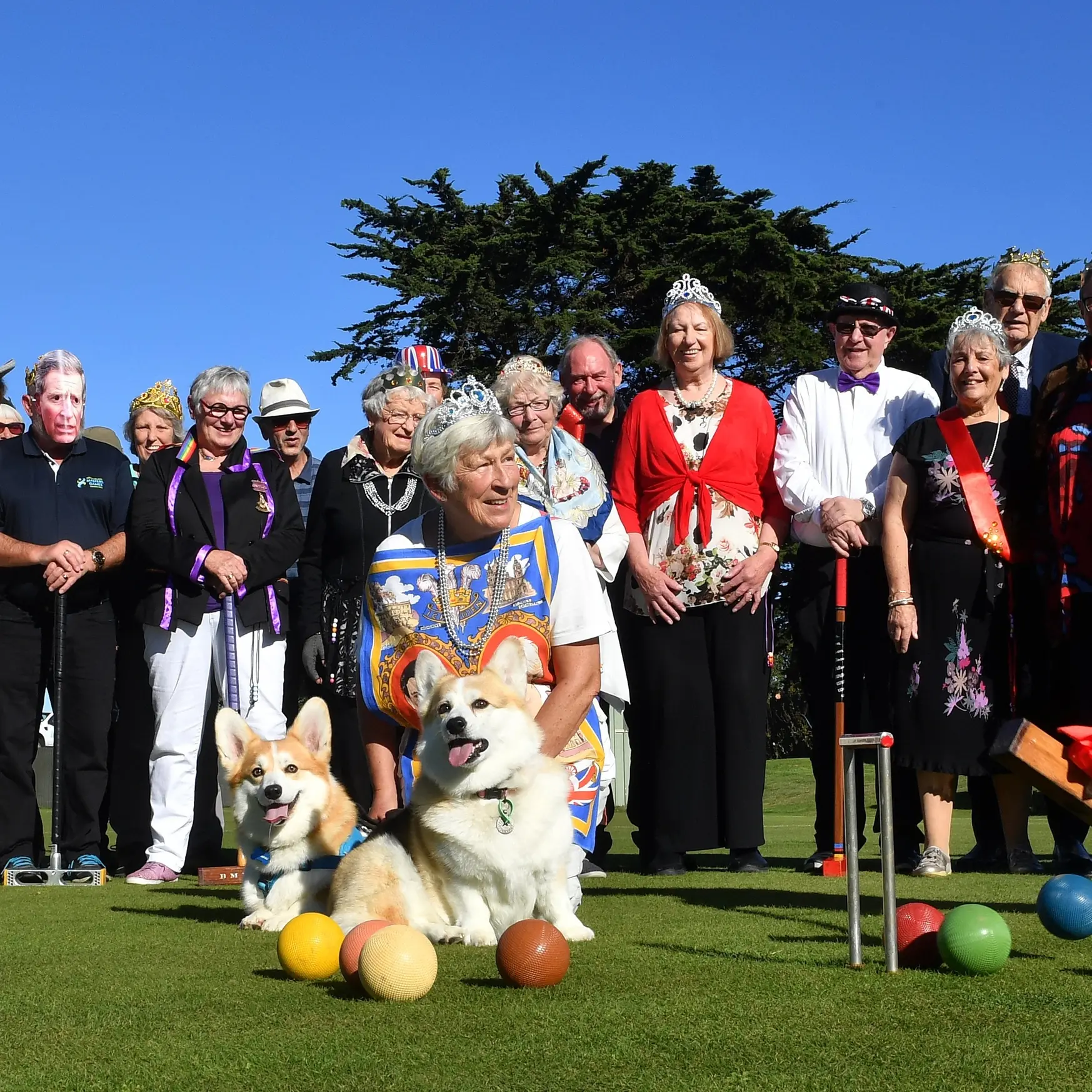 Croquet, corgis, cake mark the special day