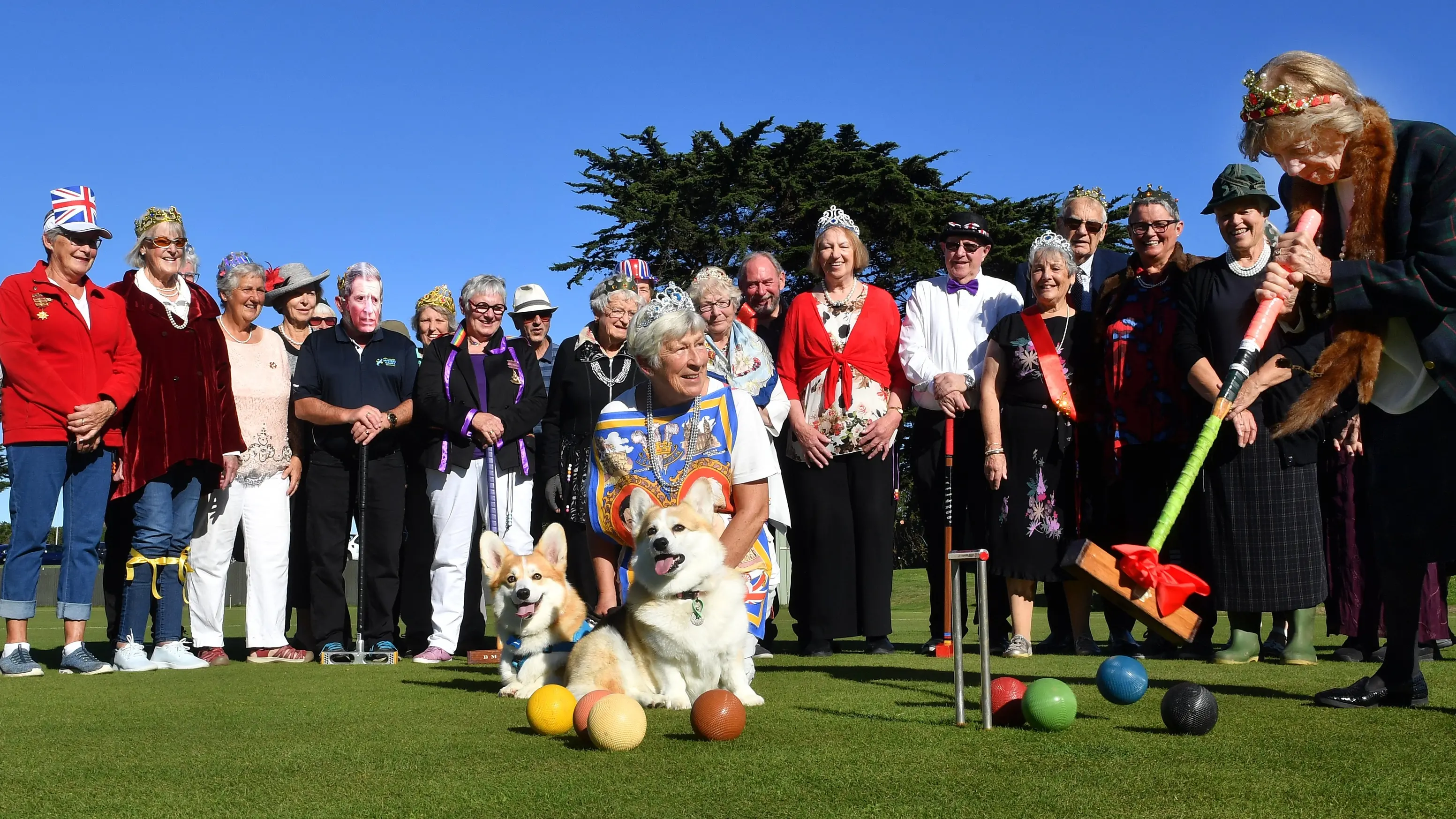 Croquet, corgis, cake mark the special day