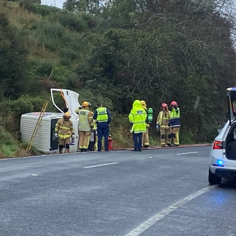 One injured after delivery van rolls off road