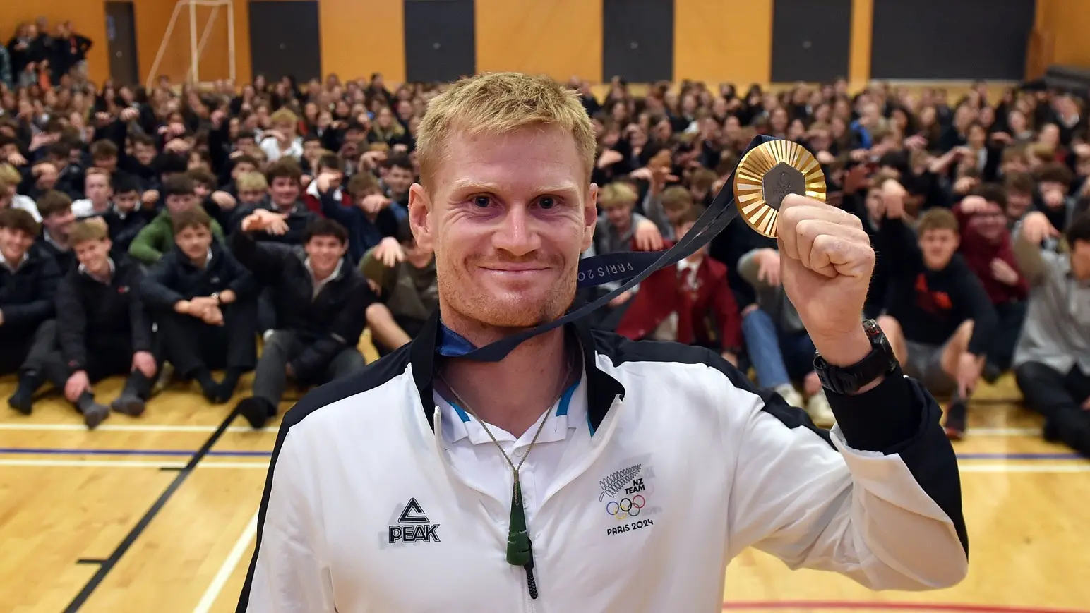 Alex’s golden boy receives hero’s welcome