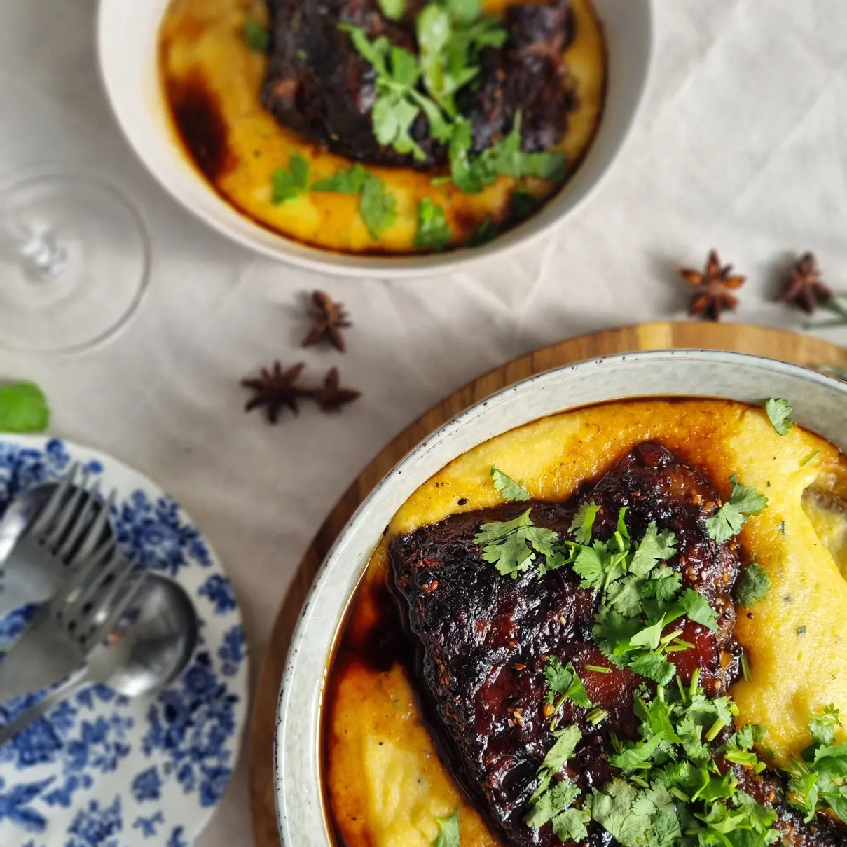 Spiced beef short ribs on creamy polenta