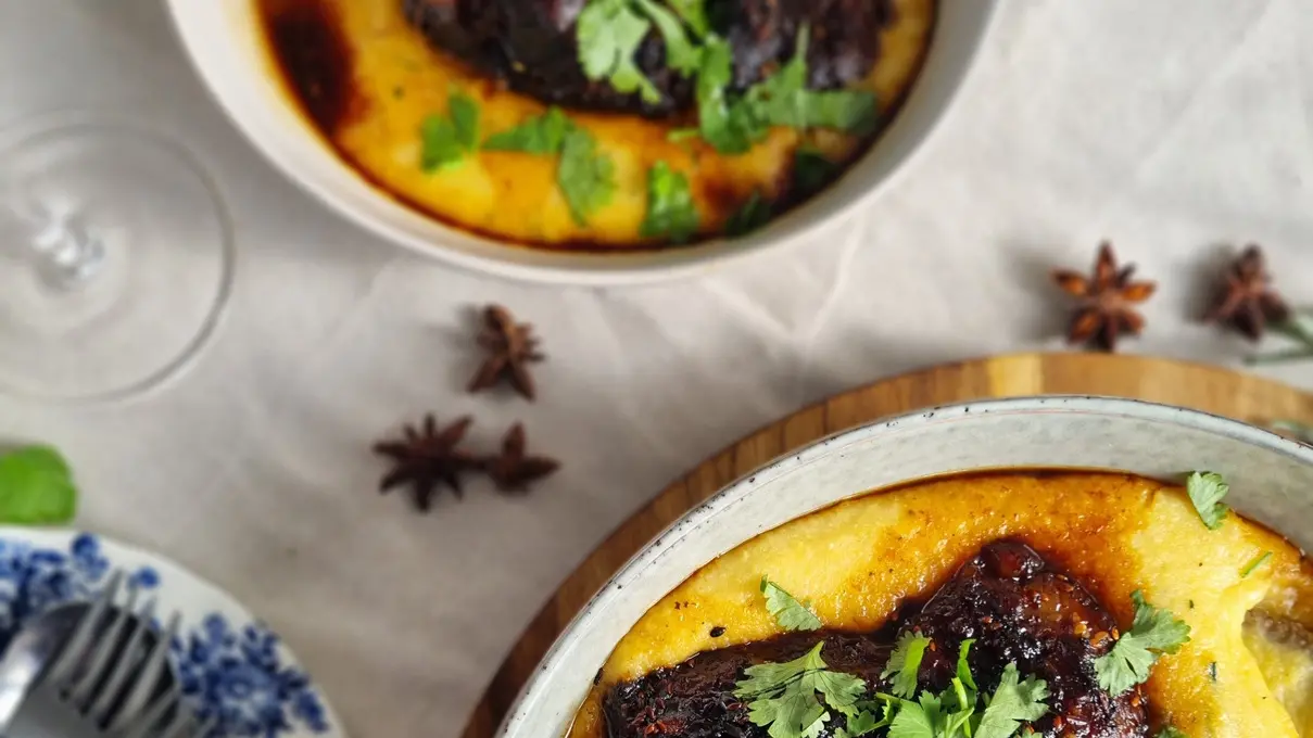 Spiced beef short ribs on creamy polenta