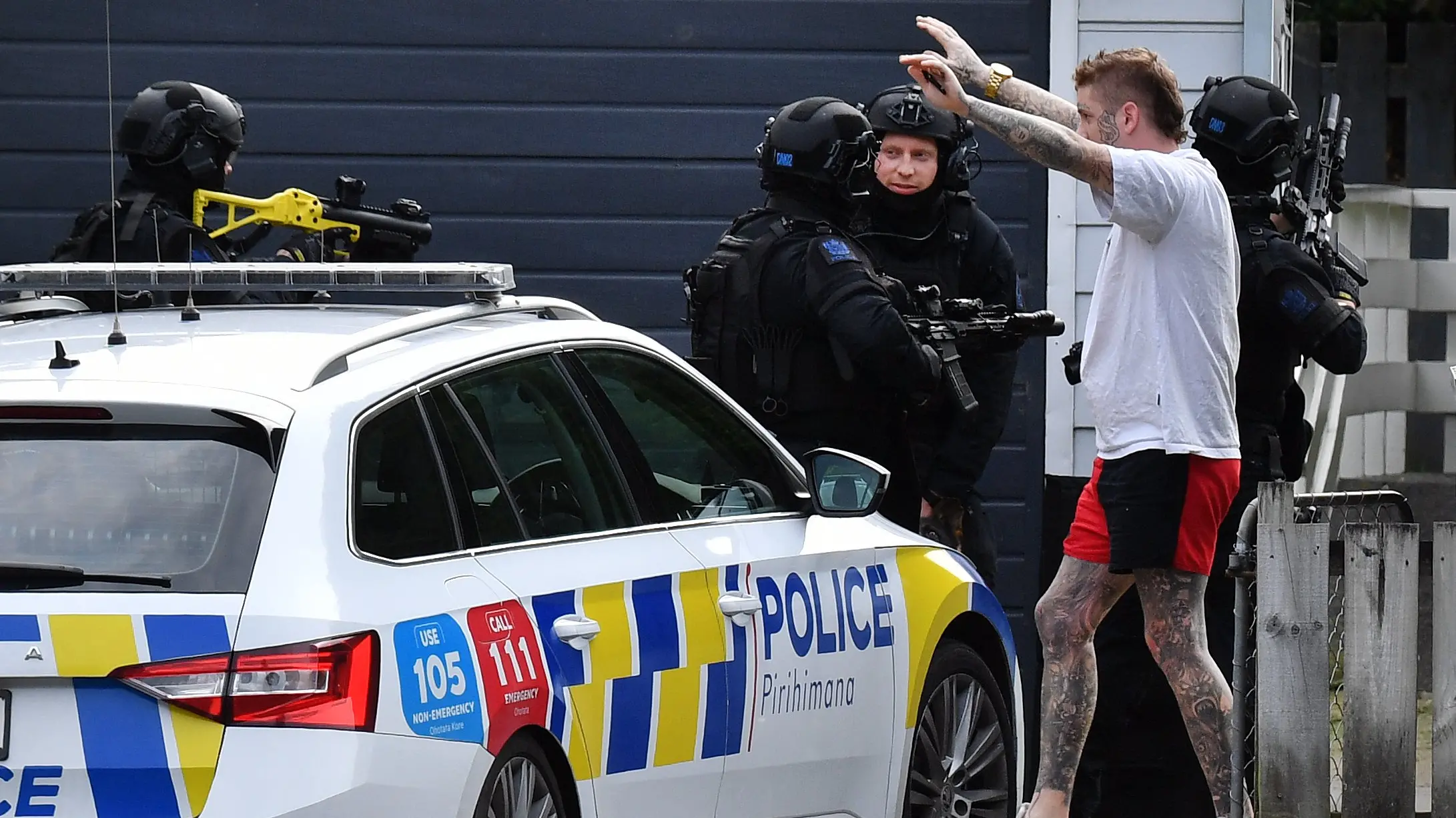 City-wide armed manhunt ends in arrests