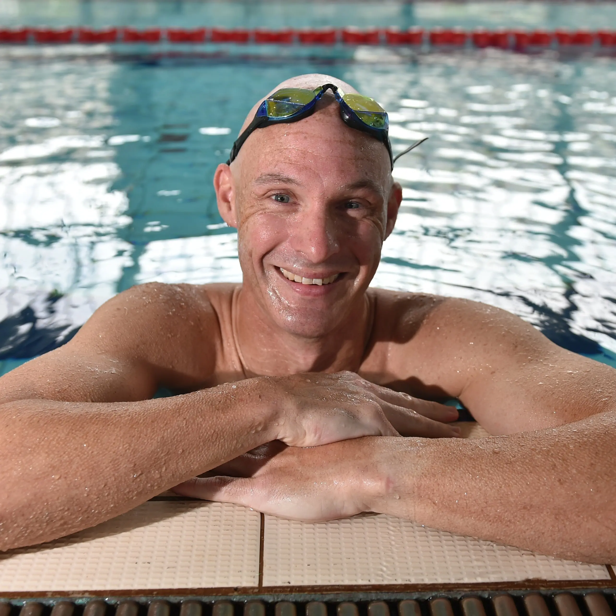Camaraderie, support draws swimmer back