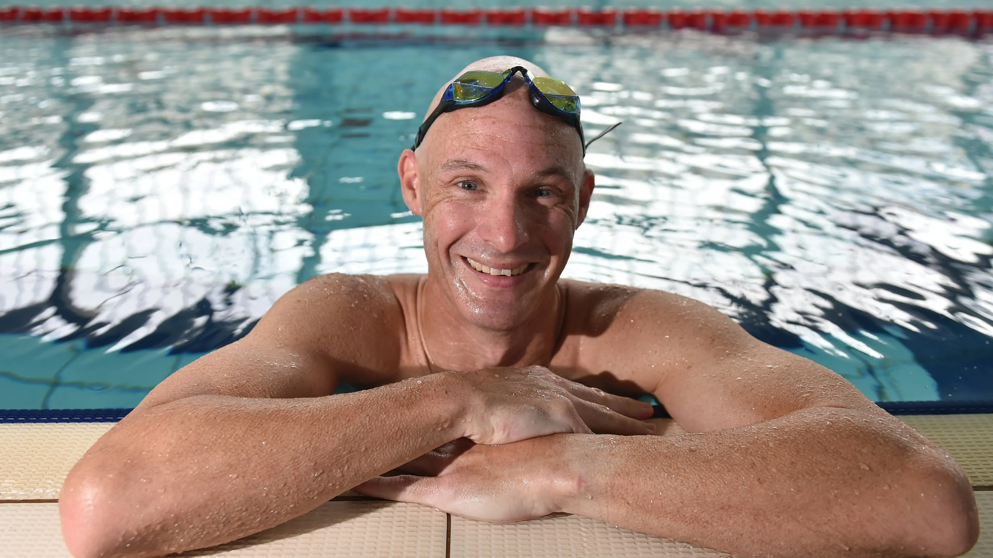 Camaraderie, support draws swimmer back