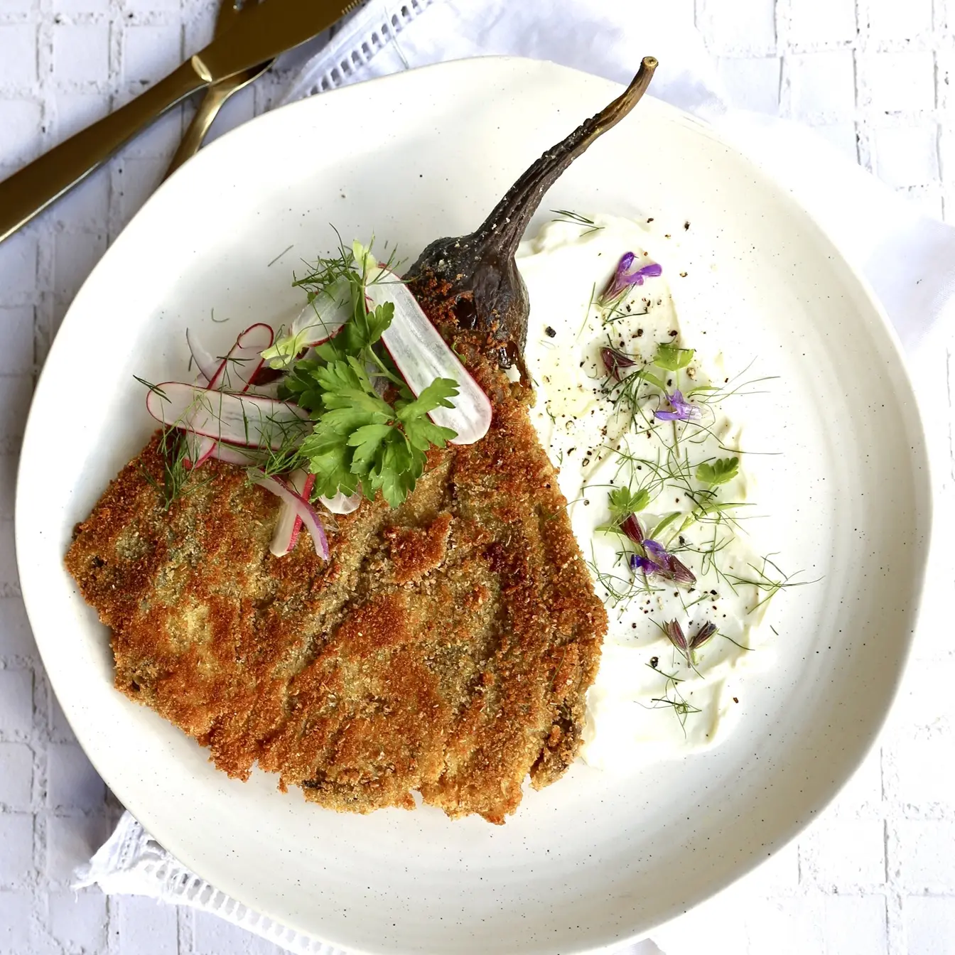 Aubergine schnitzel with lemon and yoghurt