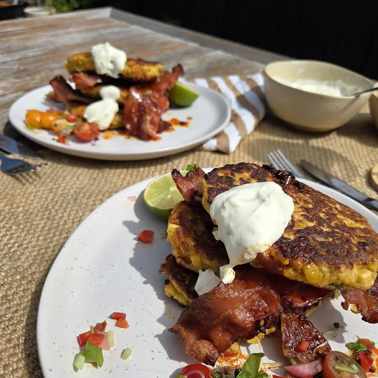 Corn fritters with bacon, lime cream & hot honey