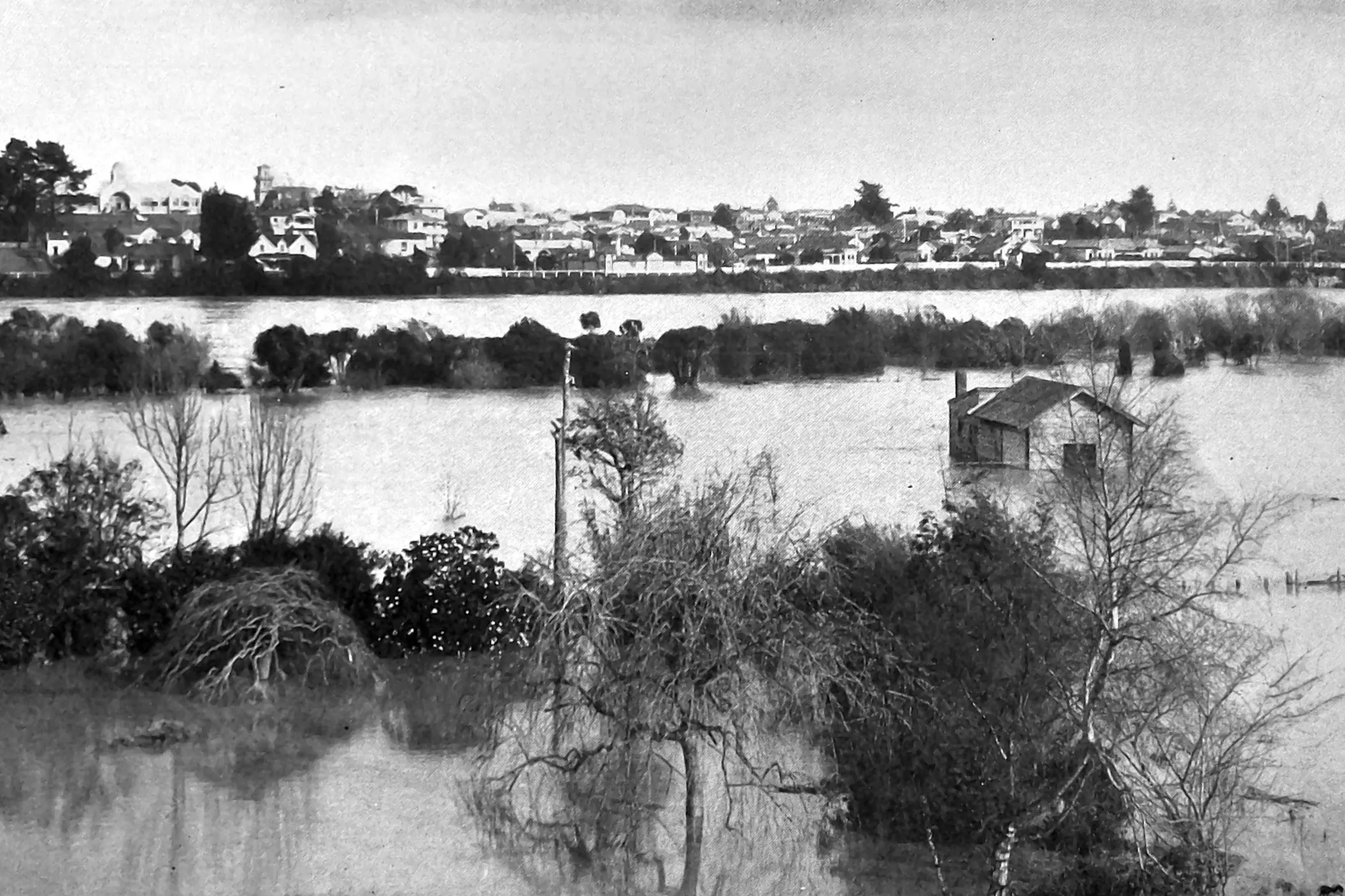 The Whanganui River floods low-lying areas of Whanganui (then known as Wanganui). Photo: Otago Witness, issue 3778,  August 10, 1926, page 42