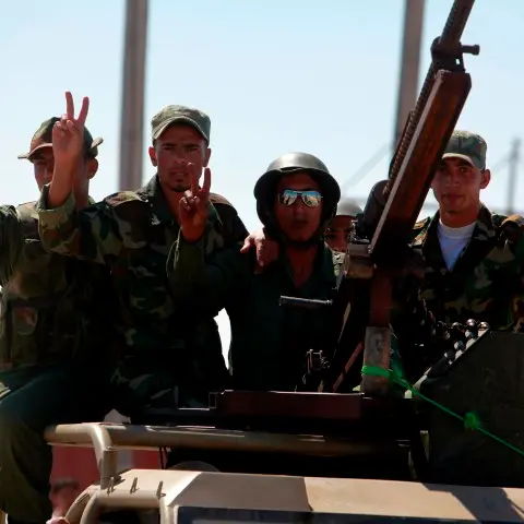 Civilians in peril in battle for Gaddafi stronghold