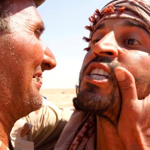 Assault on Gaddafi bastion ends in retreat