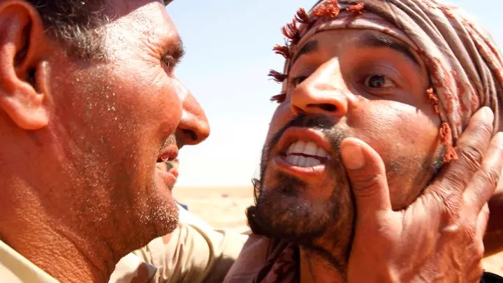 Assault on Gaddafi bastion ends in retreat
