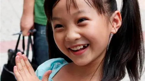 China's Olympics kid-switch: one had the looks, one had the voice