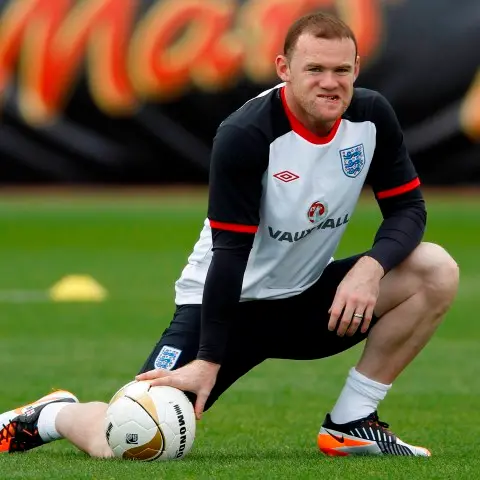 Football: Rooney cops three-match ban