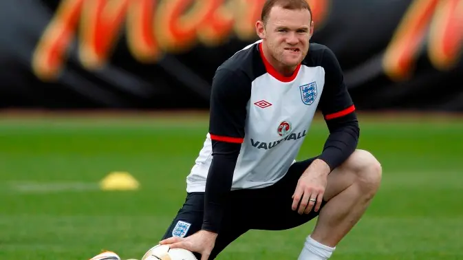 Football: Rooney cops three-match ban