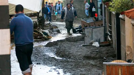 Deaths as flash floods hit Italy