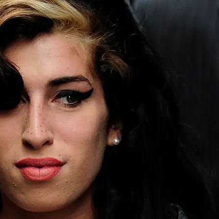 Winehouse poisoned by alcohol: Coroner