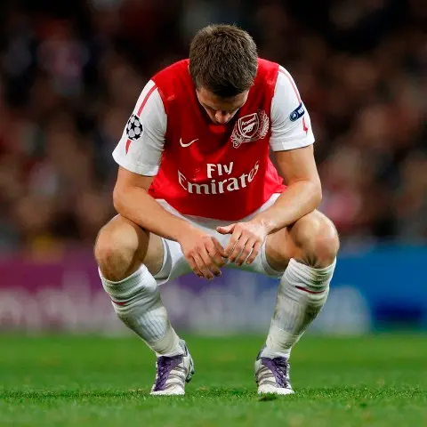 Football: Arsenal labour to Champs League draw