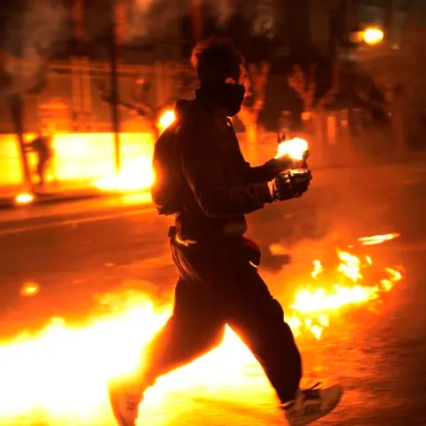 Greeks pass austerity budget after street clashes