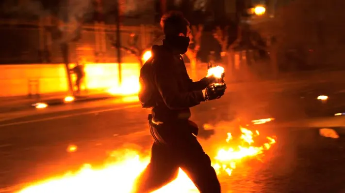 Greeks pass austerity budget after street clashes