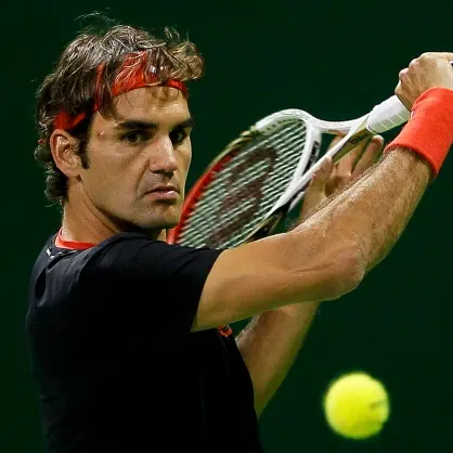 Tennis: Federer rampant, Nadal toils in Doha