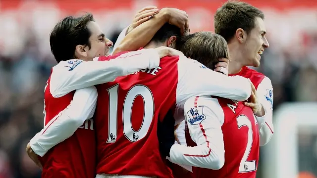 Football: League losses for Arsenal, QPR