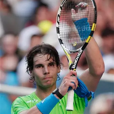 Tennis: Nadal overcomes injury to advance in Melbourne