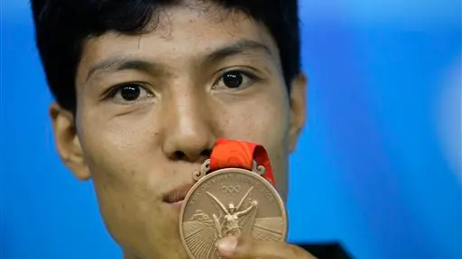 Afghan medallist wins bronze - and a house