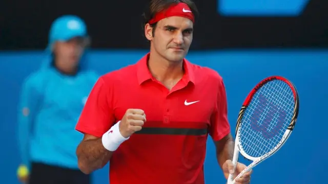 Tennis: Federer easily into Aussie Open quarters