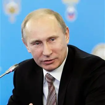Putin warns against outside interference
