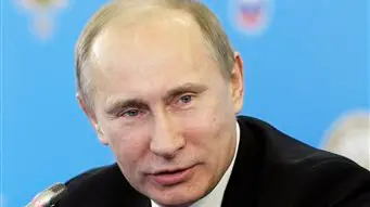Putin warns against outside interference