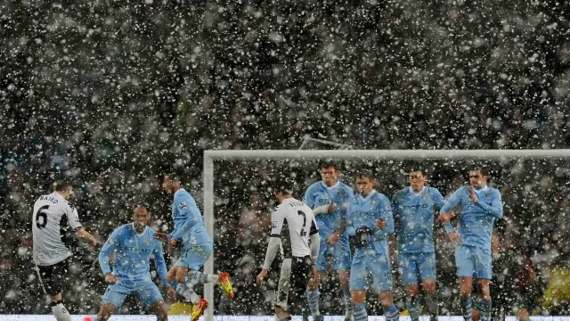 Football: Man City beat Fulham to open gap at top