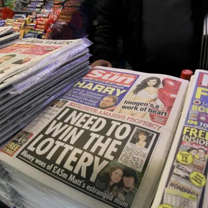 Police arrest 5 at Murdoch's Sun newspaper