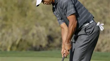 Golf: Scrutiny on Woods shifts to putting