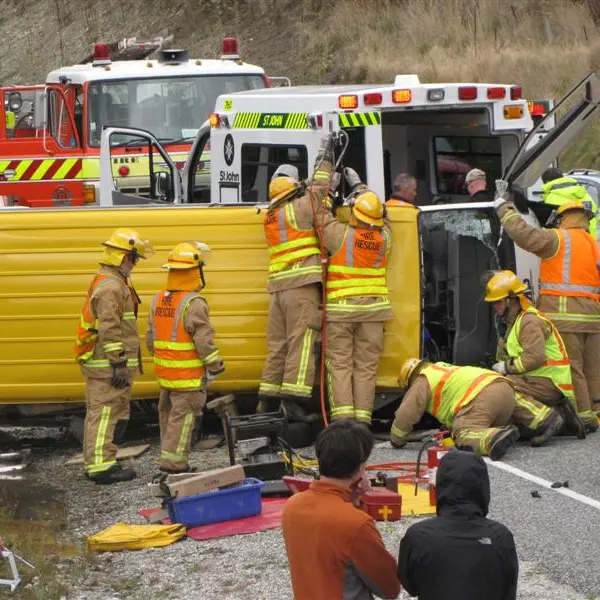 Courier driver's leg crushed in crash