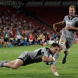 Rugby: Hurricanes strike late to edge Lions