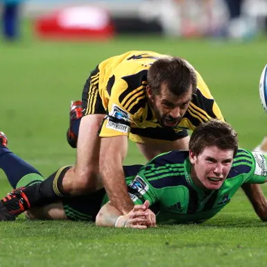 Rugby: Slade stars in close win