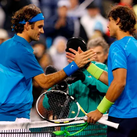 Tennis: Isner shocks Djokovic to set up final date with Federer