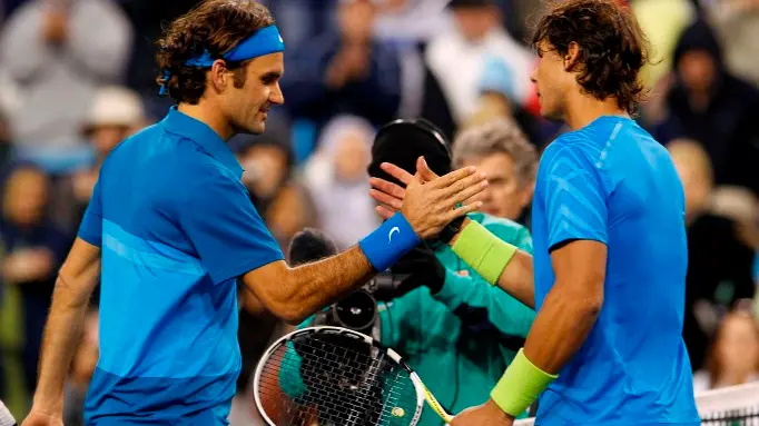 Tennis: Isner shocks Djokovic to set up final date with Federer