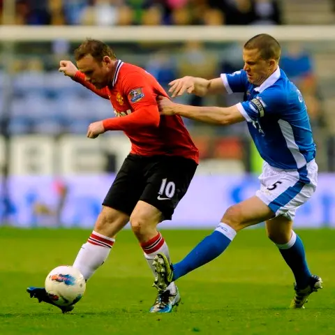 Football: Lethargic Man United lose at Wigan