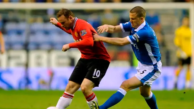 Football: Lethargic Man United lose at Wigan