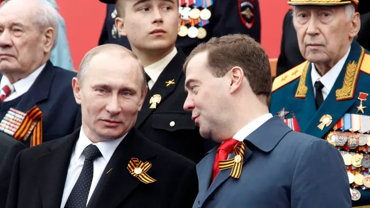 Putin promises strong Russia; opponents jailed