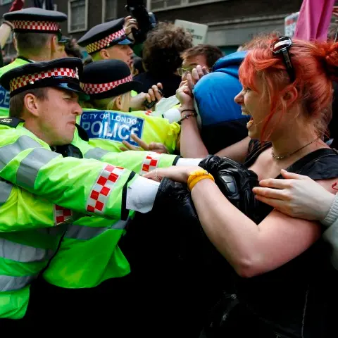 Thousands march to mark protest milestone