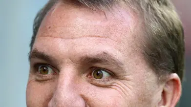 Football: Swansea coach to take up Liverpool job