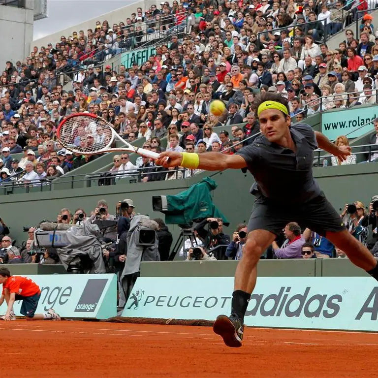 Tennis: Djokovic survives scare to make last eight