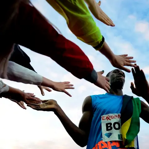 Athletics: Bolt made to work for 100m win