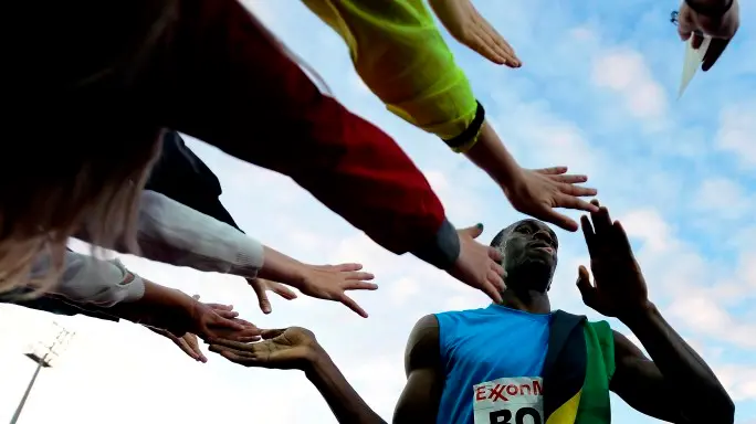 Athletics: Bolt made to work for 100m win
