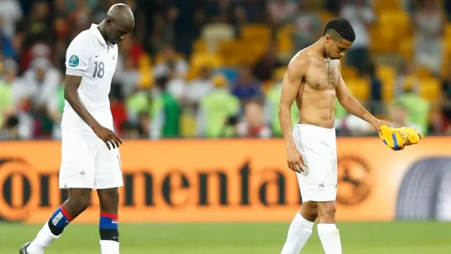 Football: France loses but still make quarters